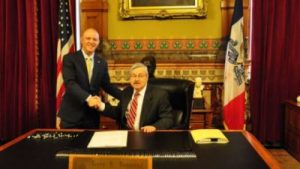 Image (1) terry-branstad-drew-klein-after-branstad-signs-union-busting-bill-300x169.jpeg for post 36779